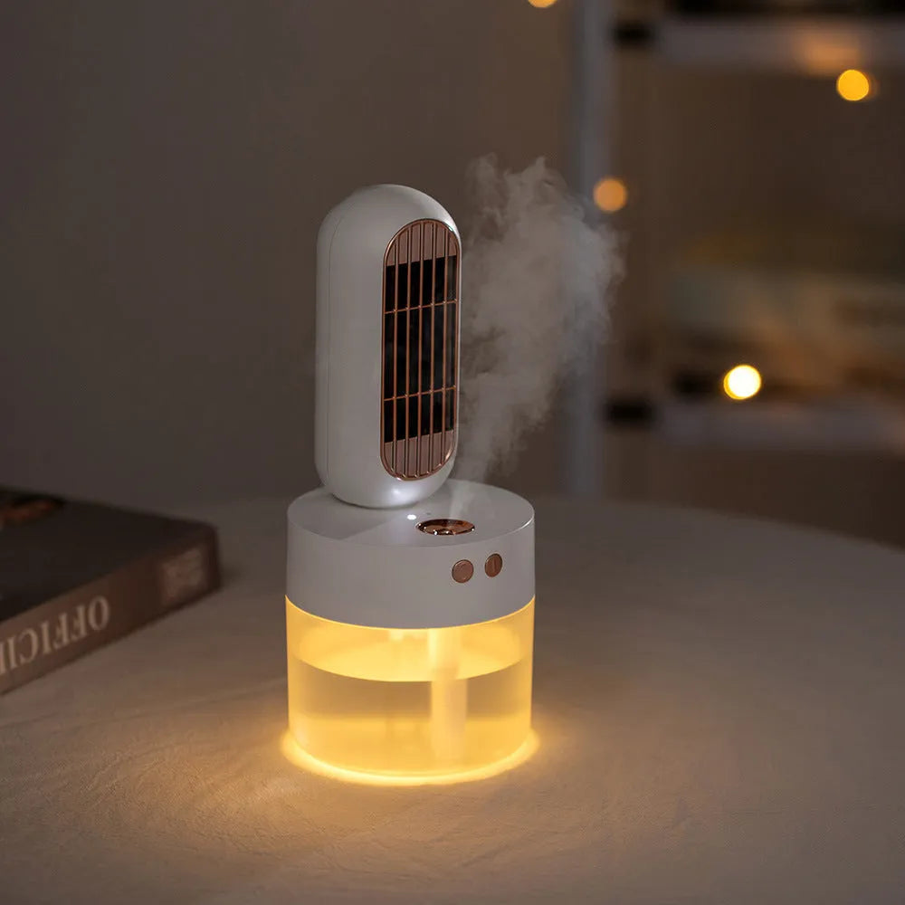 Small black and white oscillating humidifier fan with mechanical controls on desktop