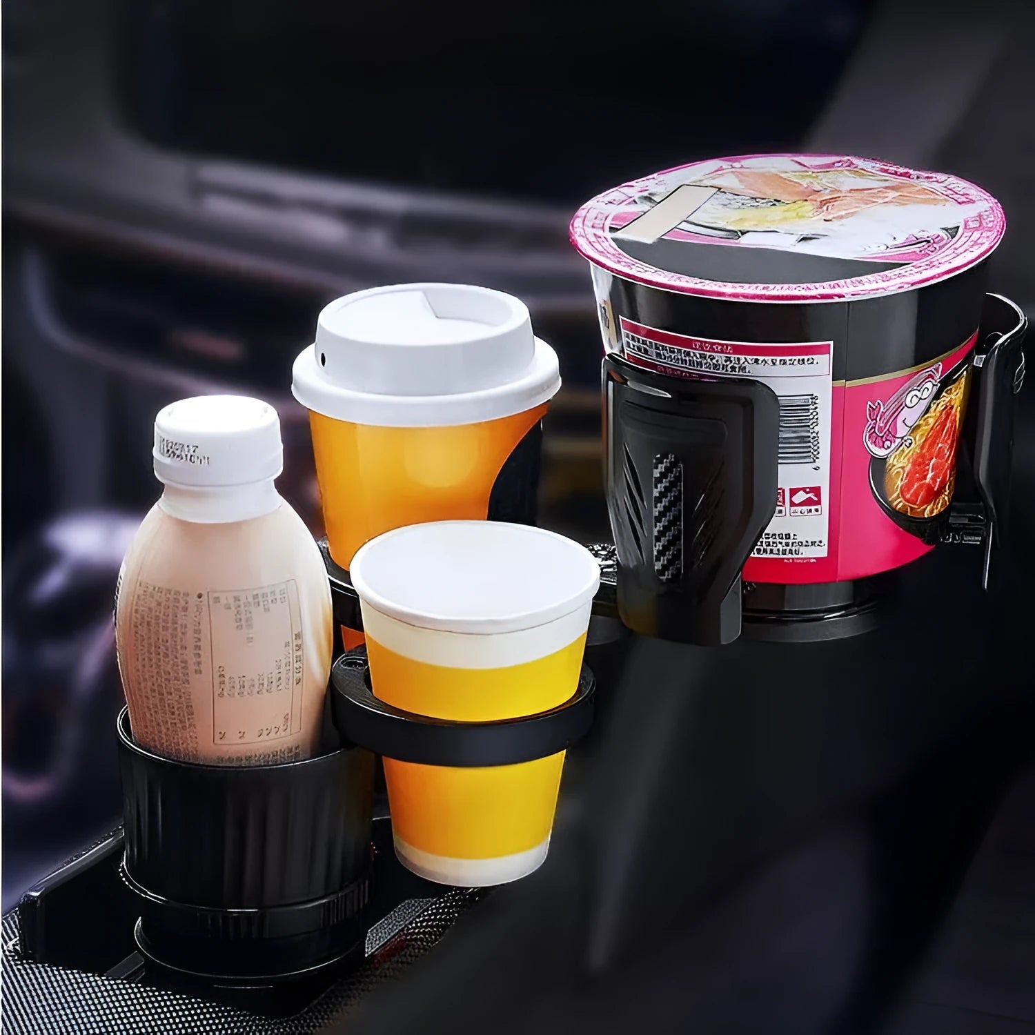 Carbon fibre black car cup holder with retractable base adjusting between 6.5 and 10 centimetres