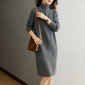 Beige woolen skirt with half zipper front, stand collar and loose long sleeves in straight dress silhouette