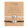 Black and white mixed colour alloy electroplated sports bracelet with geometric square shape on neutral background