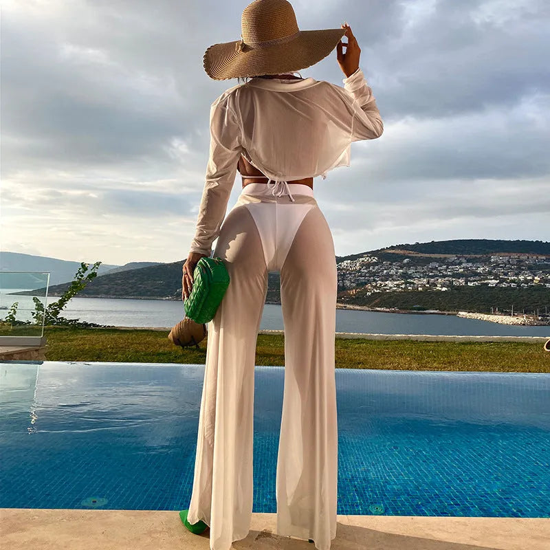 White women's swimwear four-piece set with high-waisted bottoms and backless top on a mannequin