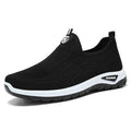 Men's black and grey casual tennis shoes with mesh lining and flat PVC sole.