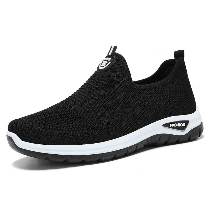 Men's black and grey casual tennis shoes with mesh lining and flat PVC sole.