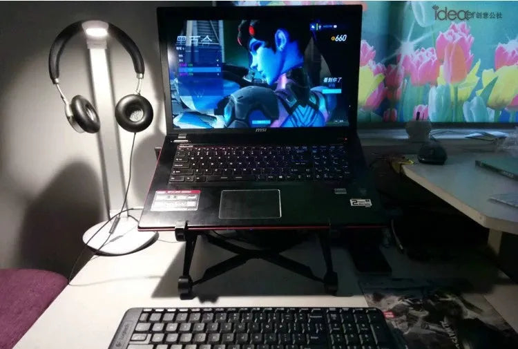 Sagacious black foldable laptop stand with lifting mechanism and carrying case