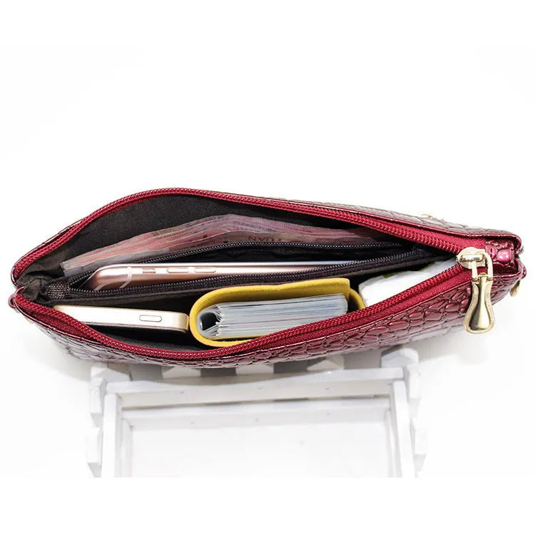 Women's black PU leather messenger shoulder bag showing dimensions and lining
