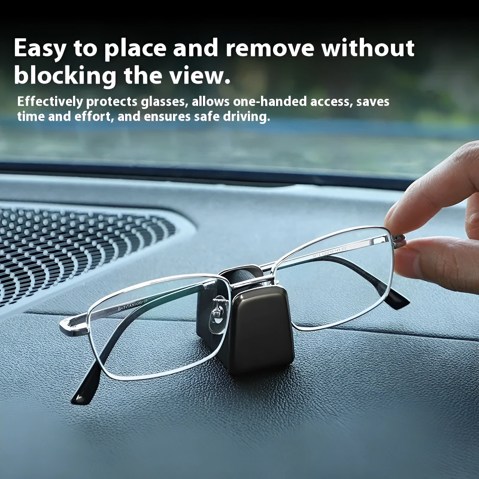 Zinc alloy and leather car dashboard glasses clip holder in green, shown on a car dashboard.