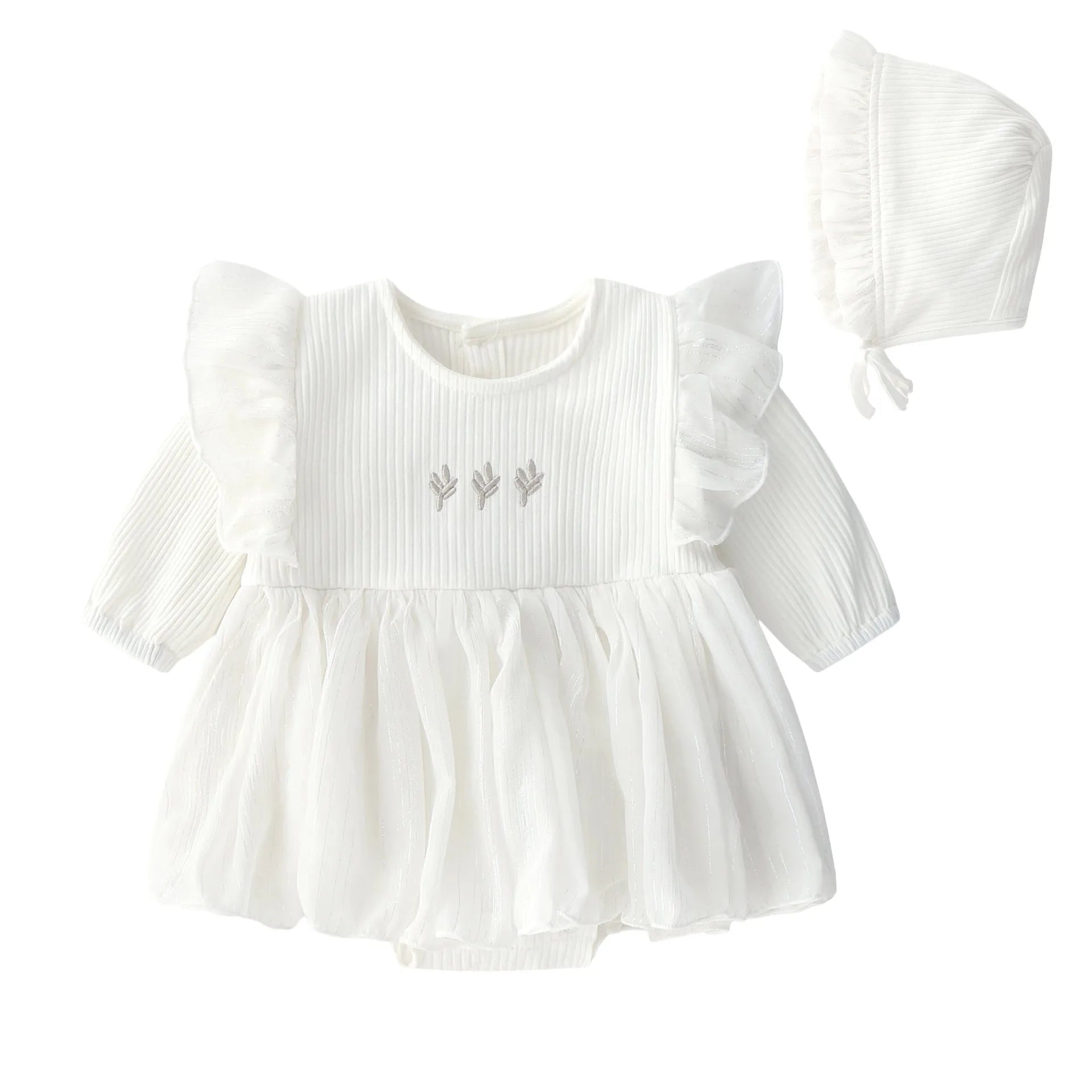 Baby girl wearing a fluffy cotton princess dress in pink, available in red and white, sizes 59cm to 80cm.