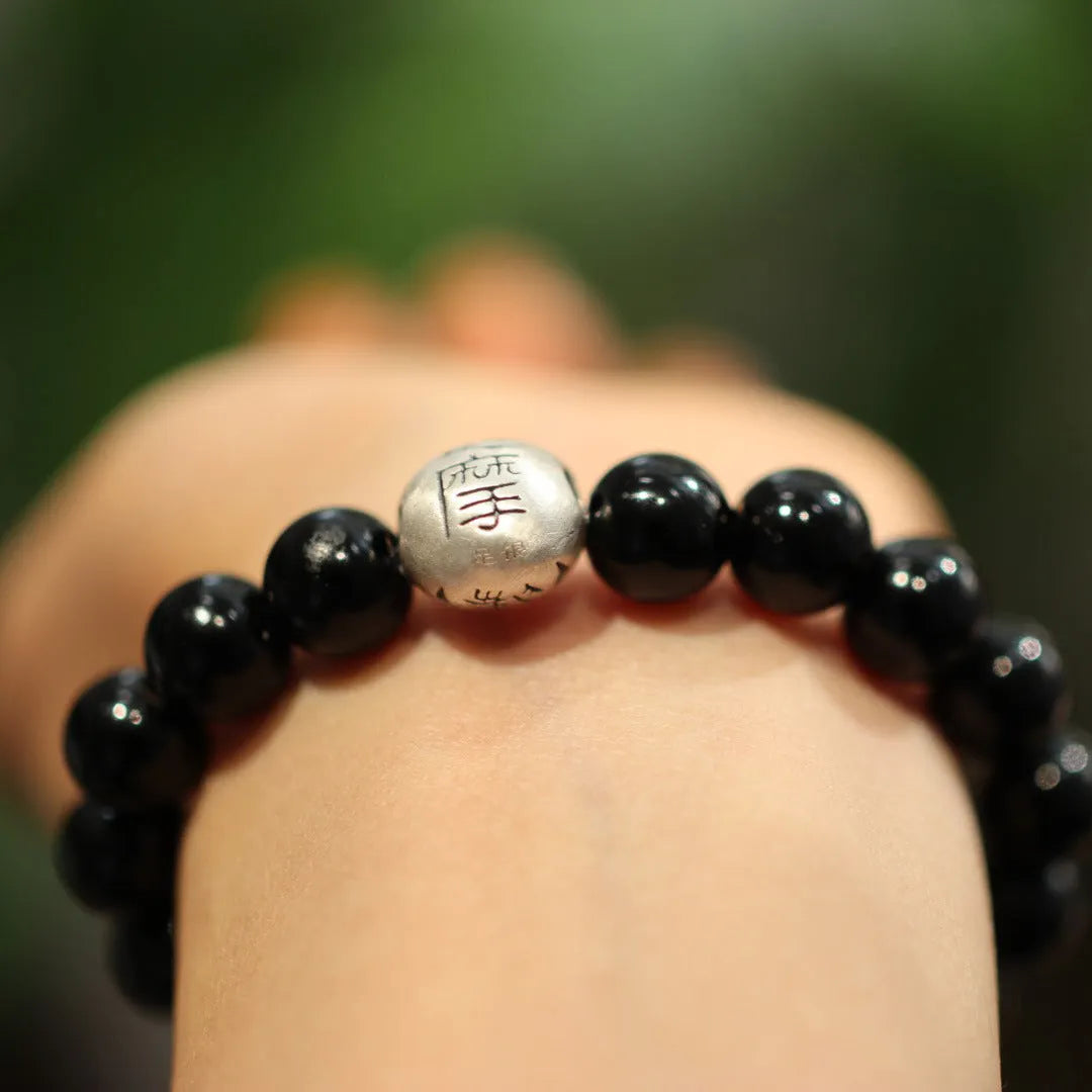 Chinese-style black agate bracelet with 10mm beads and sterling silver clasp