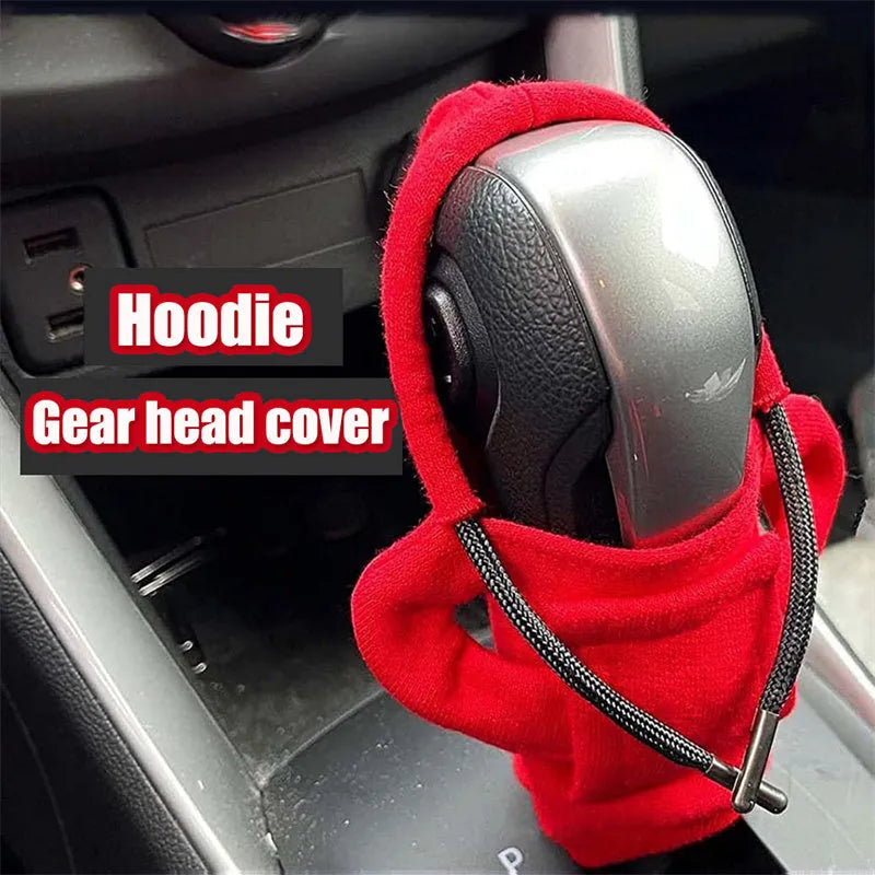 Universal 12cm pure cotton gear knob cover in hoodie style with adjustable drawcord, shown in black