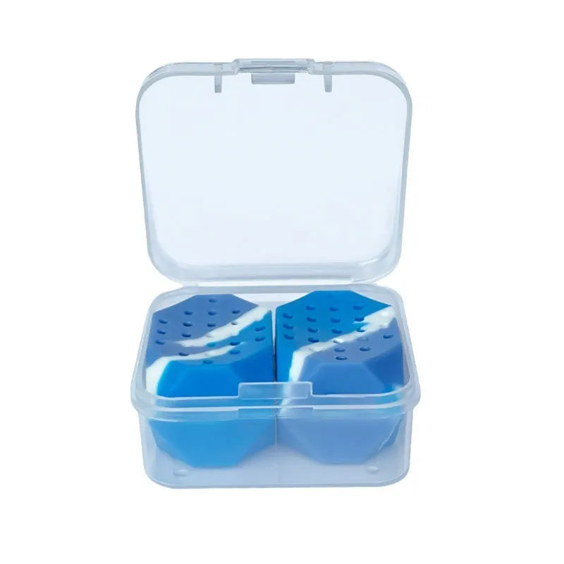 Two camouflage-pattern silicone facial exercise balls in a transparent box.
