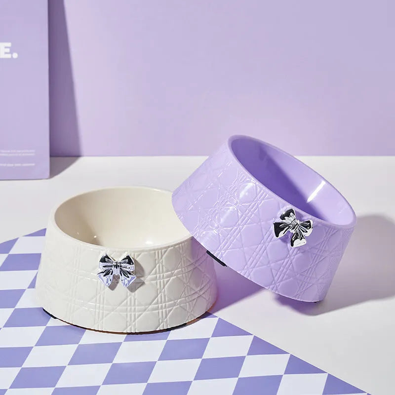 Ceramic pet bowl with diamond pattern and bow design in multiple colour options