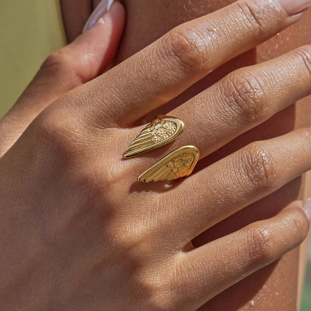Stainless steel wings design ring with adjustable opening in electroplated colour options