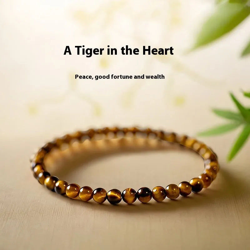 Tigereye stone bracelet with geometric design showing round beads in new Chinese style