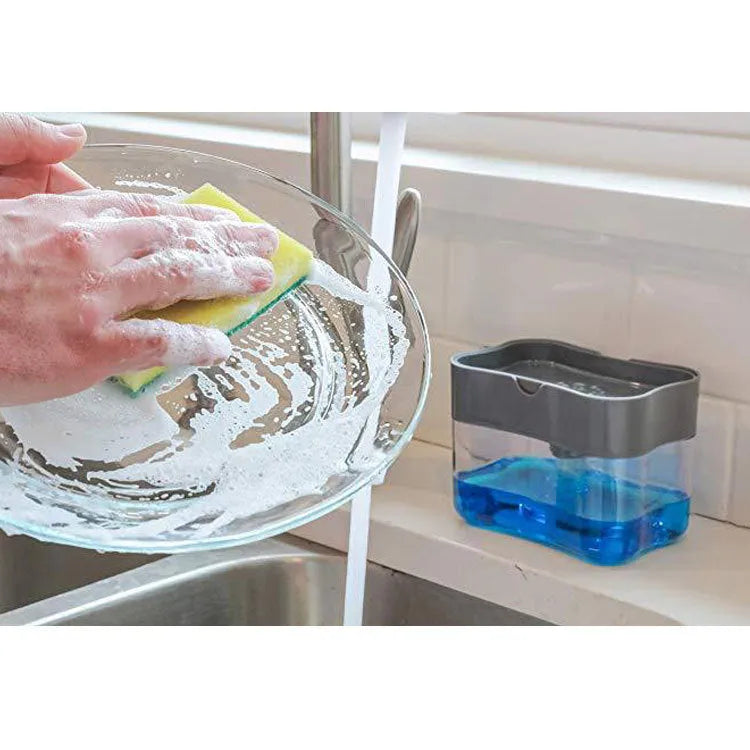 A grey plastic soap dispenser with a pump top on a kitchen countertop