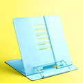 Blue telescopic metal bookshelf for primary school students holding upright books on desk
