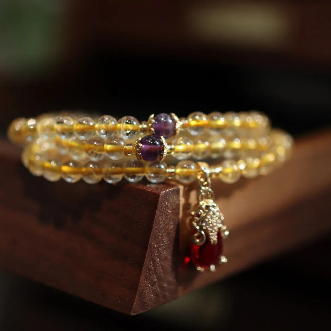 Natural Brazilian gold rutilated quartz bracelet with Chinese style design and hanging chopsticks