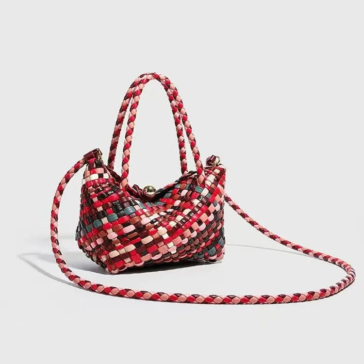 Colourful women's woven shoulder bag made from PU leather with braided texture.