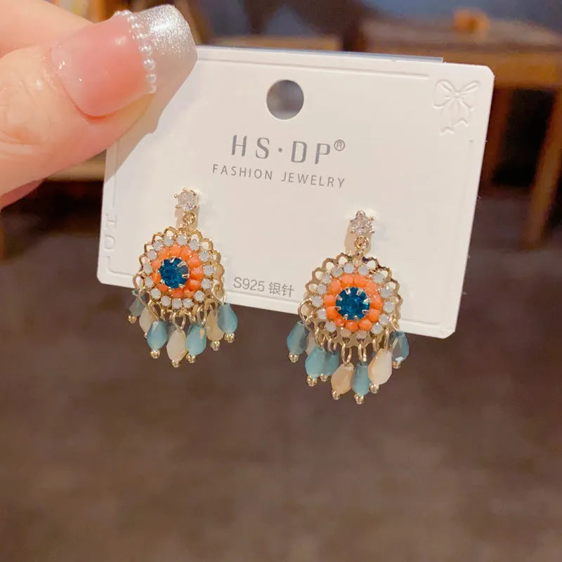 Purple diamond round crystal tassel earrings with thick gold-plated geometric design