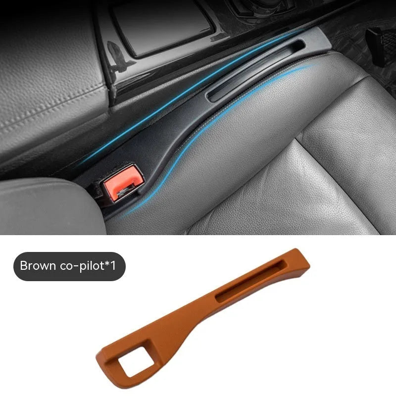 Black car seat gap storage box organiser between vehicle front seats with customisable handles