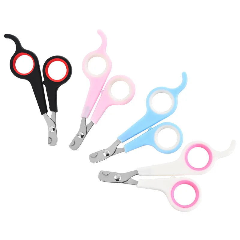 Mini pet nail clippers in plastic, blue white colour, on a light background