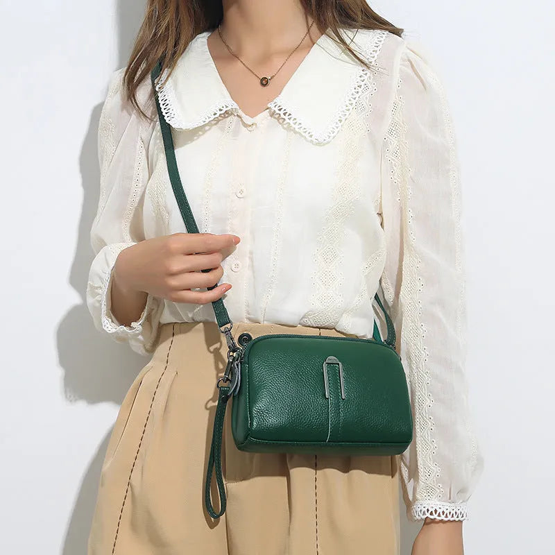 Genuine leather women's square shoulder bag in dark khaki colour, showing structured horizontal shape.