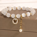 White crystal bracelet with geometric design and cat's eye stones in Korean style