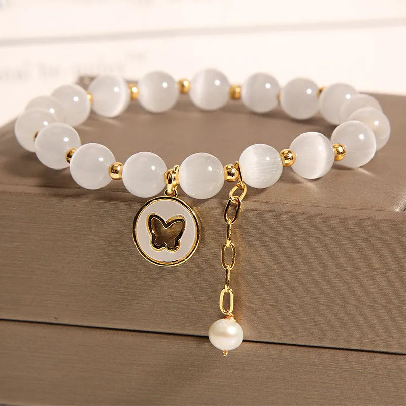 White crystal bracelet with geometric design and cat's eye stones in Korean style
