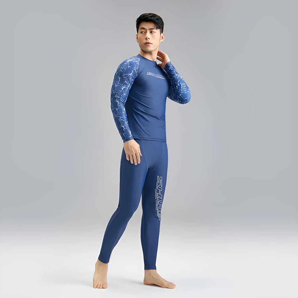 Dark blue men's two-piece swimwear set with a top and trousers on a mannequin.