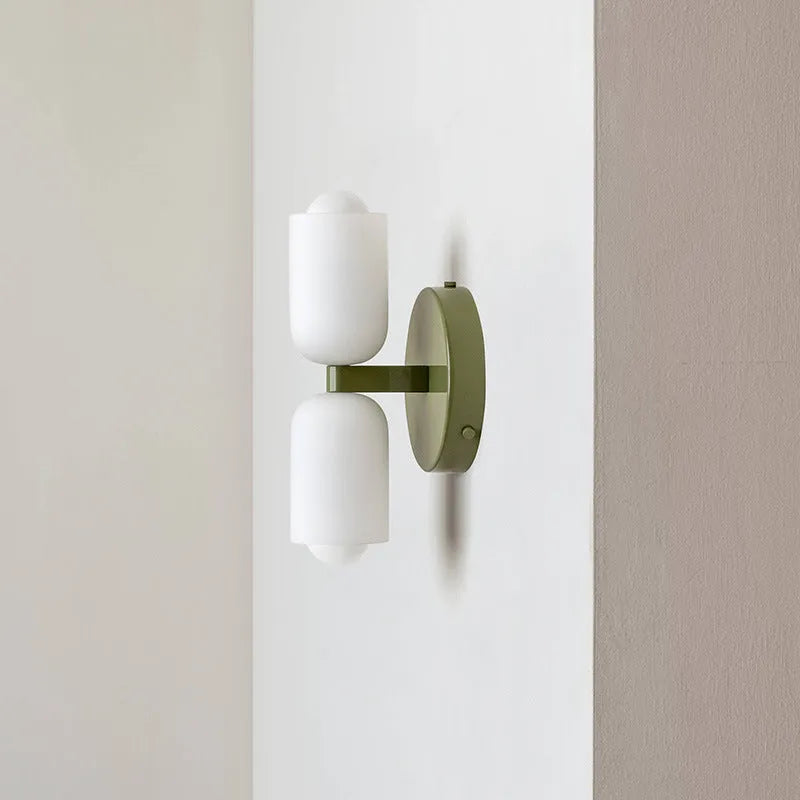 Cream style double head wall lamp with white glass shade and iron base for bedroom