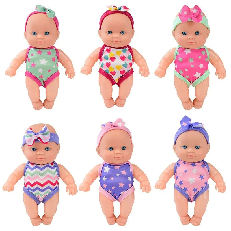 Vinyl baby figurine doll with movable limbs showing detailed facial features