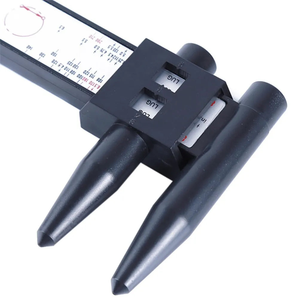 Electronic digital caliper hole distance measuring tool on a workbench