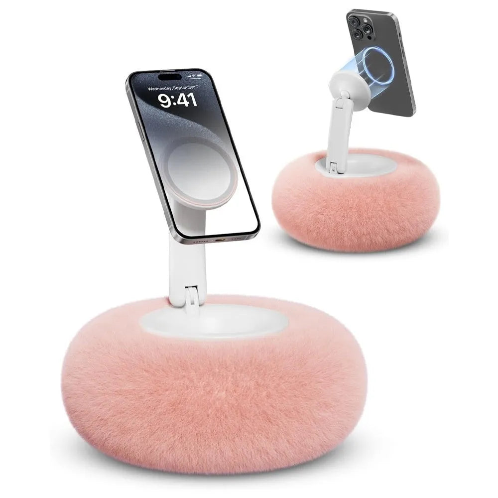 Magnetic mobile phone pillow bracket stand in pink, creamy-white, and khaki green on a bedside table