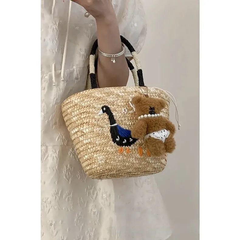 Women's hand-woven straw khaki tote bag with open outer pocket