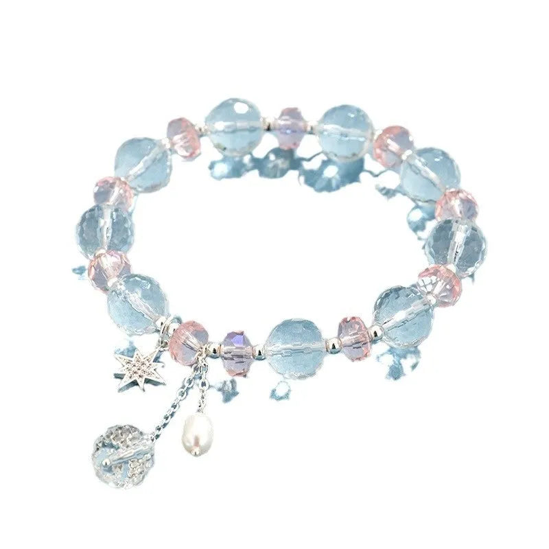 White crystal women's bracelet with diamond-shaped charms and lucky cat element on silver-tone chain