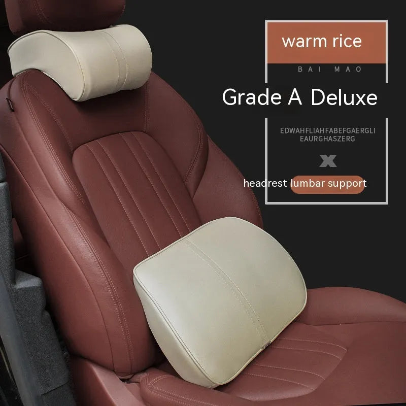 Car seat cushion headrest with memory foam interior and leather exterior in solid colour