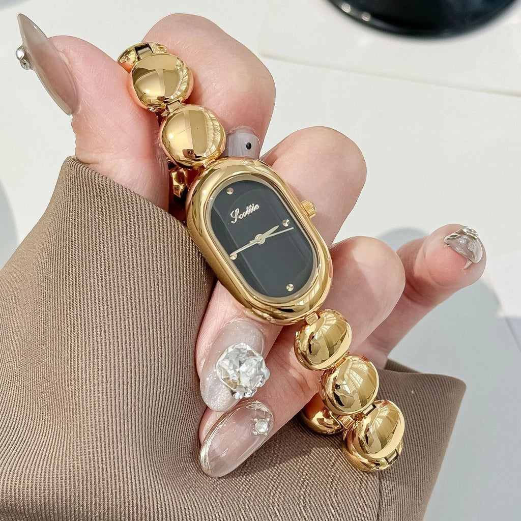 Oval women's watch with 9mm case thickness shown in multiple colour finishes