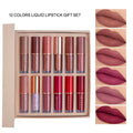Boxed set of 12 matte shimmer lip glazes in various shades on a pink background.