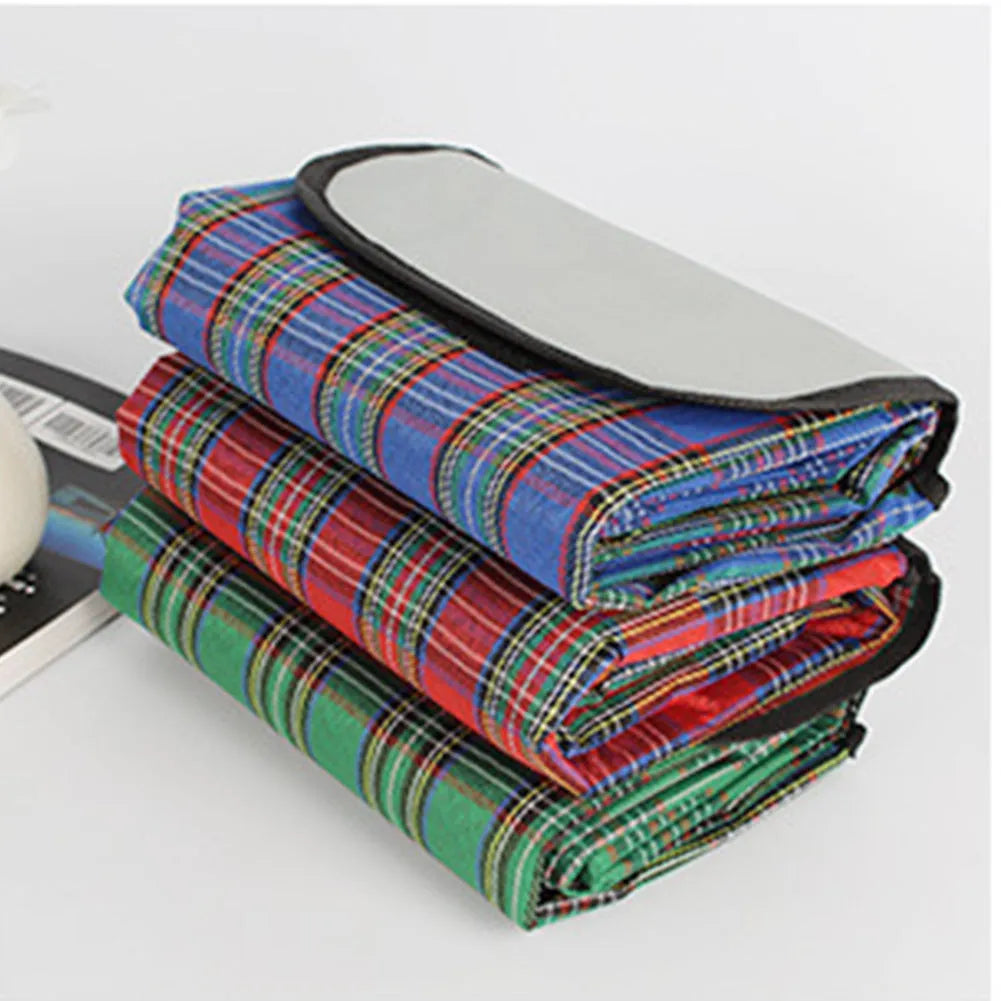 Waterproof acrylic picnic mat in green, red, or blue plaid, 150 x 100cm, with one cushion