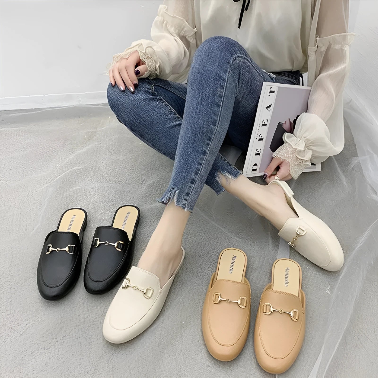 Women's PVC closed-toe half slipper with a buckle, shown in milky white colour.