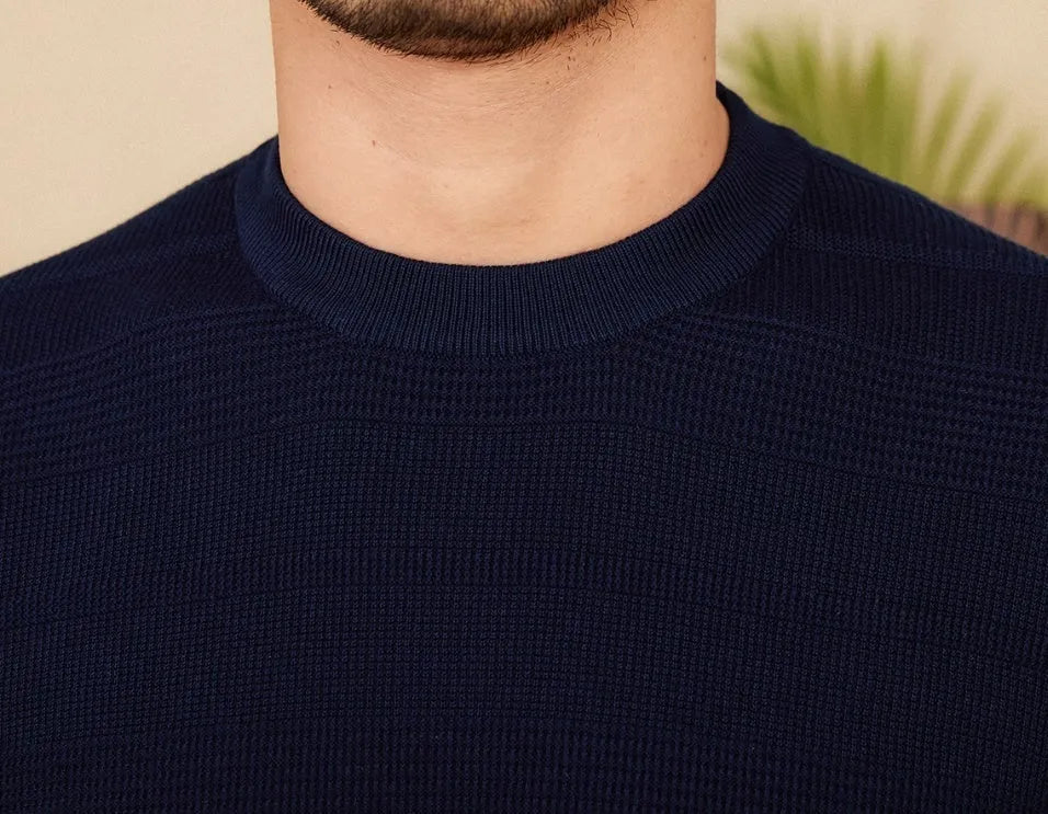 Men's retro-style short-sleeved cotton T-shirt on a hanger, shown in off-white and royal blue colour options.