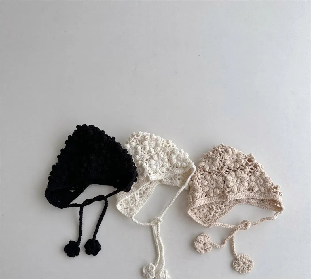 Breathable lace-up earflap winter hat for girls in beige with dome crown and jacquard weave