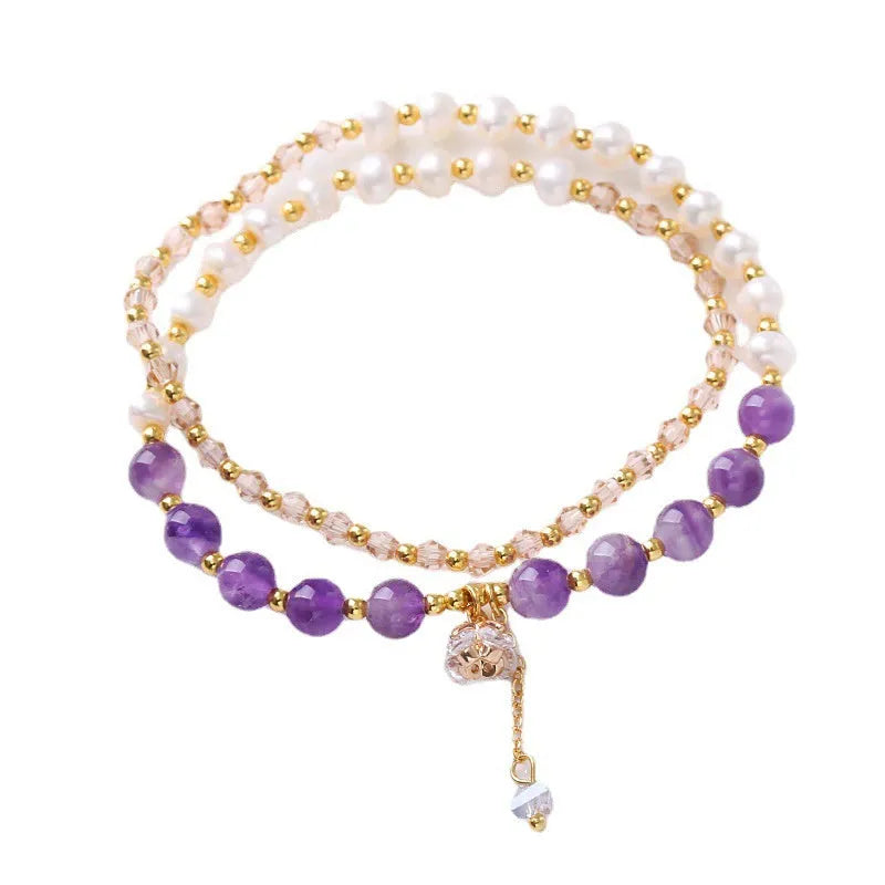 Handcrafted women's double ring crystal bracelet in amethyst, aquamarine, or strawberry quartz colour.