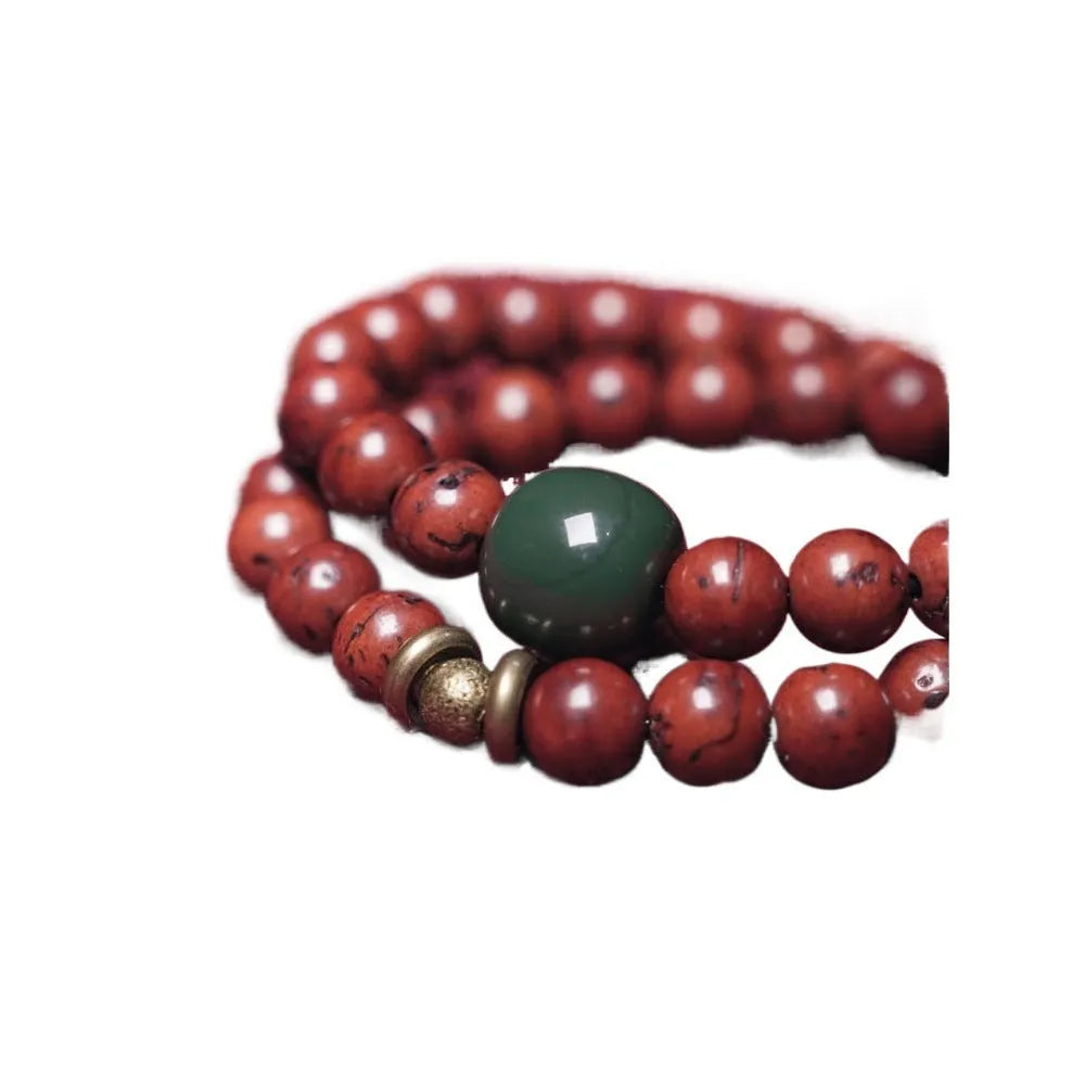 Bodhi seed double circle bracelet with cartoon charms on wrist