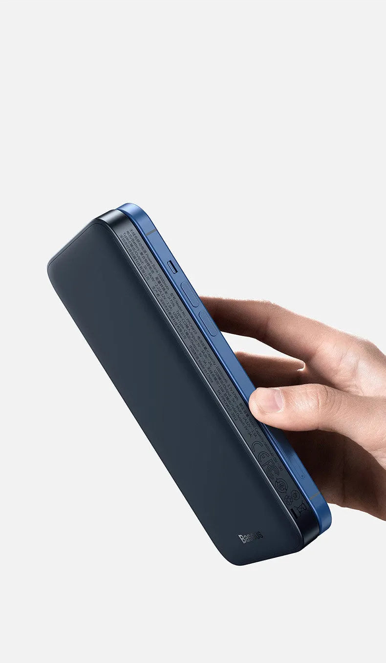 Blue and white MagSafe magnetic wireless power bank with LCD display showing battery percentage