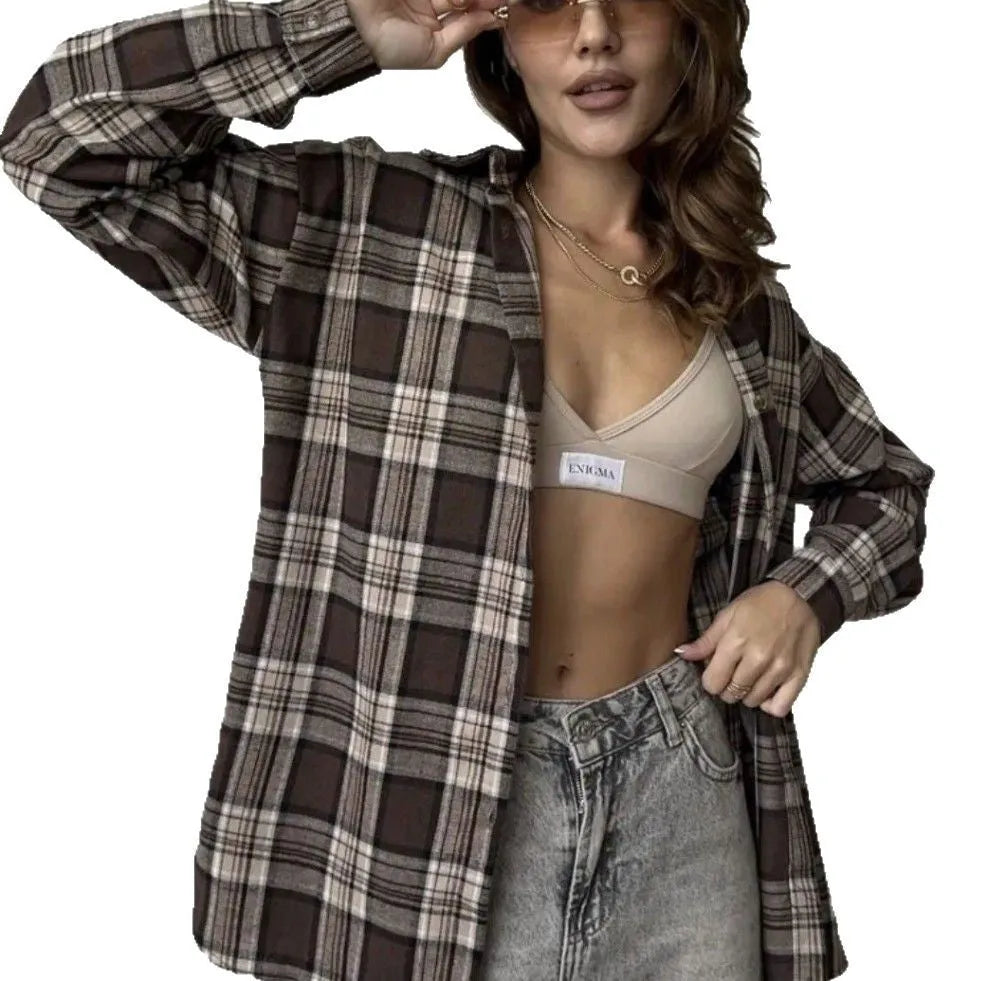 Dark brown striped women's long sleeve shirt in retro style on a hanger