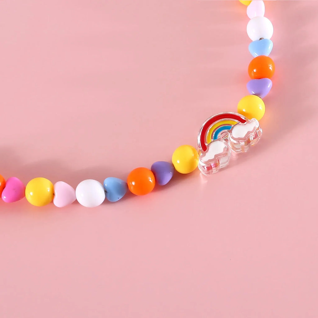 Colourful plastic pearl bead cat collar necklace showing rainbow, peach and small flower design options