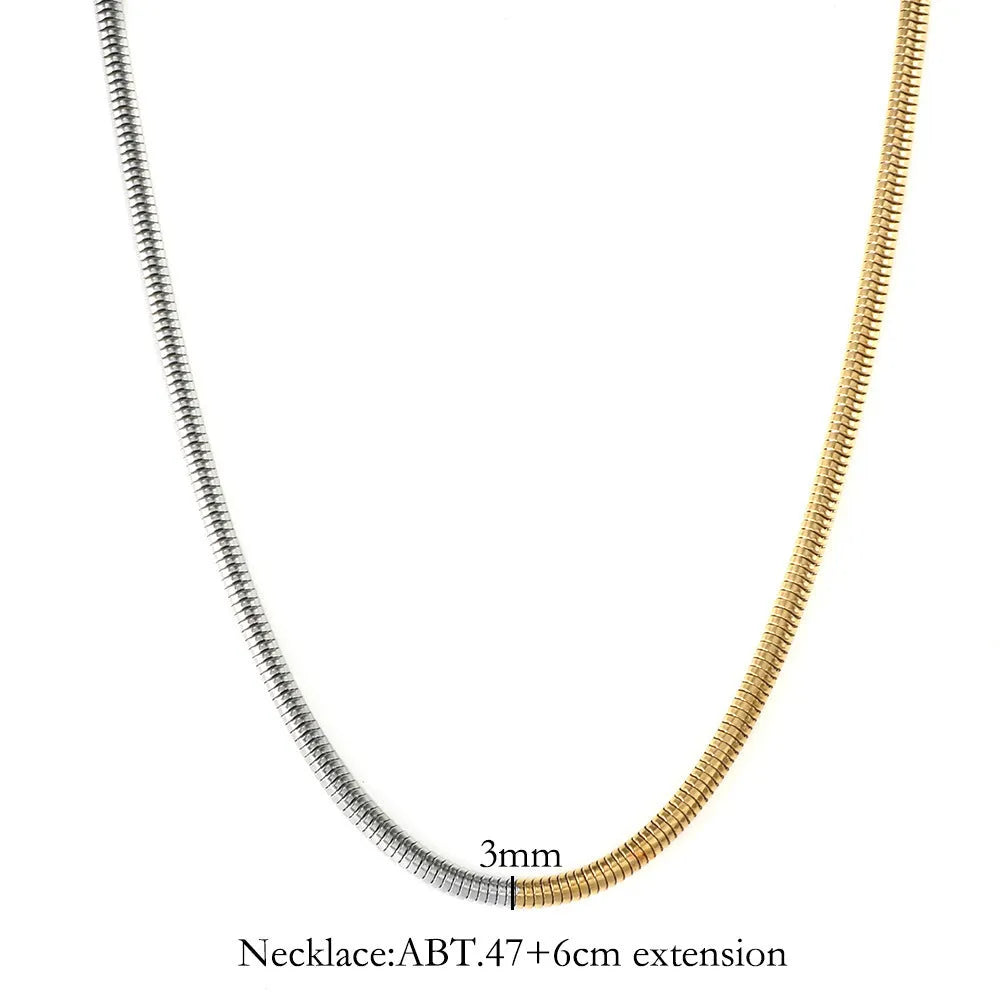Women's cold golden 3mm wide stainless steel snake bones chain necklace, geometric design.