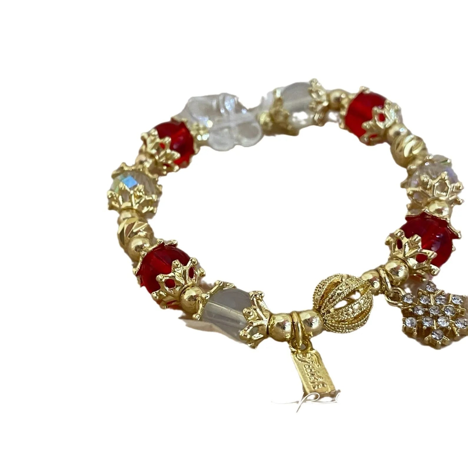 Women's bracelet with snowflake pendant and bow charm in galaxy colours on alloy construction