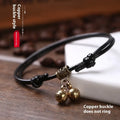 Adjustable nylon dog collar with brass buckle and bell in black, red, or coffee colours