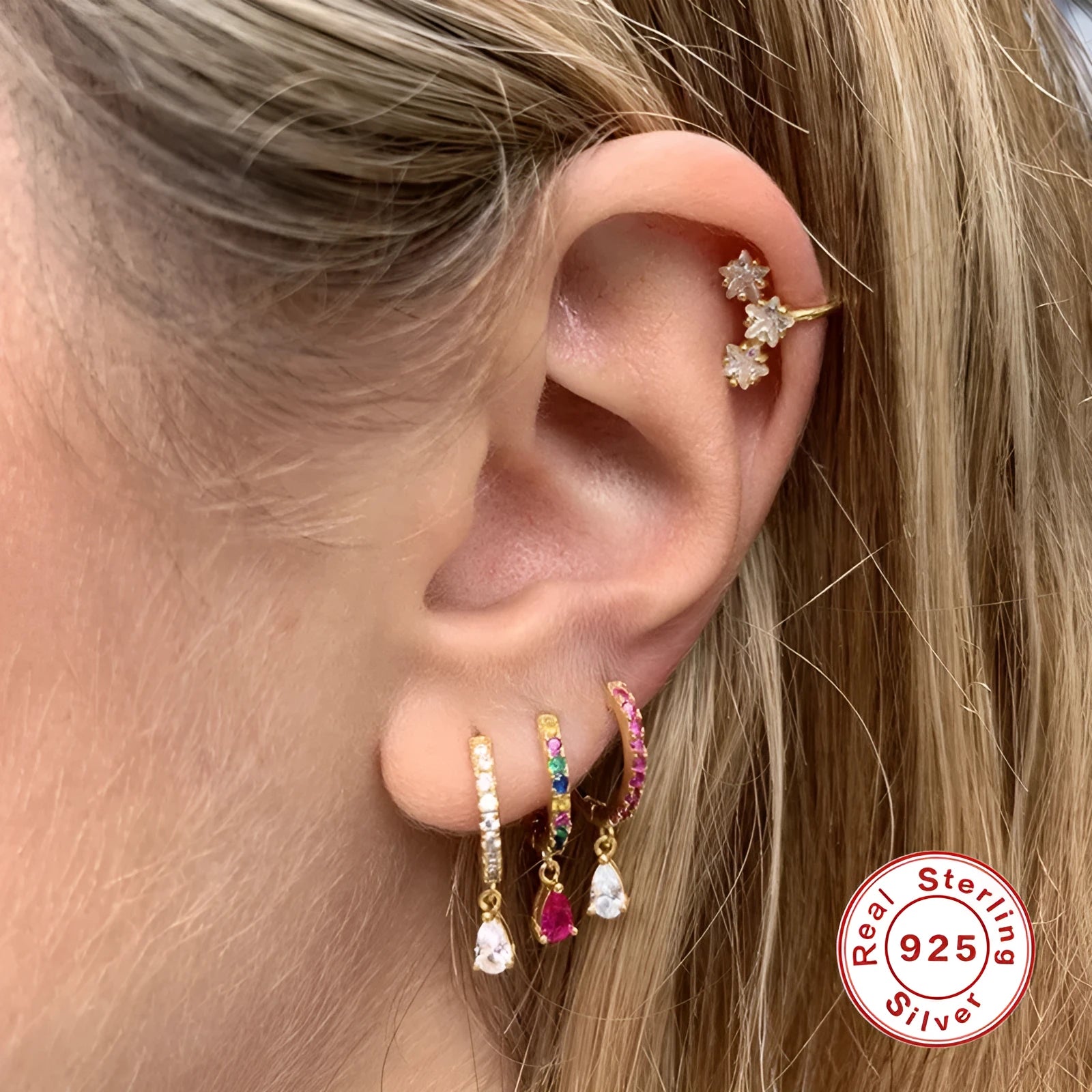 S925 sterling silver geometric water drop earring with selected pendant stone on gold or silver tone background.